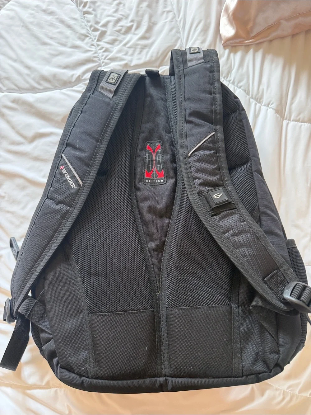 Black Swiss-Style Backpack with Fireball Logo